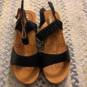 Brand new in the Box black sandals